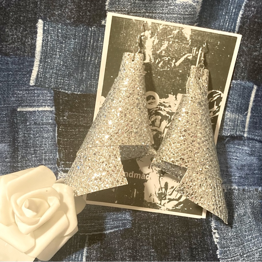 The silver angles earrings
